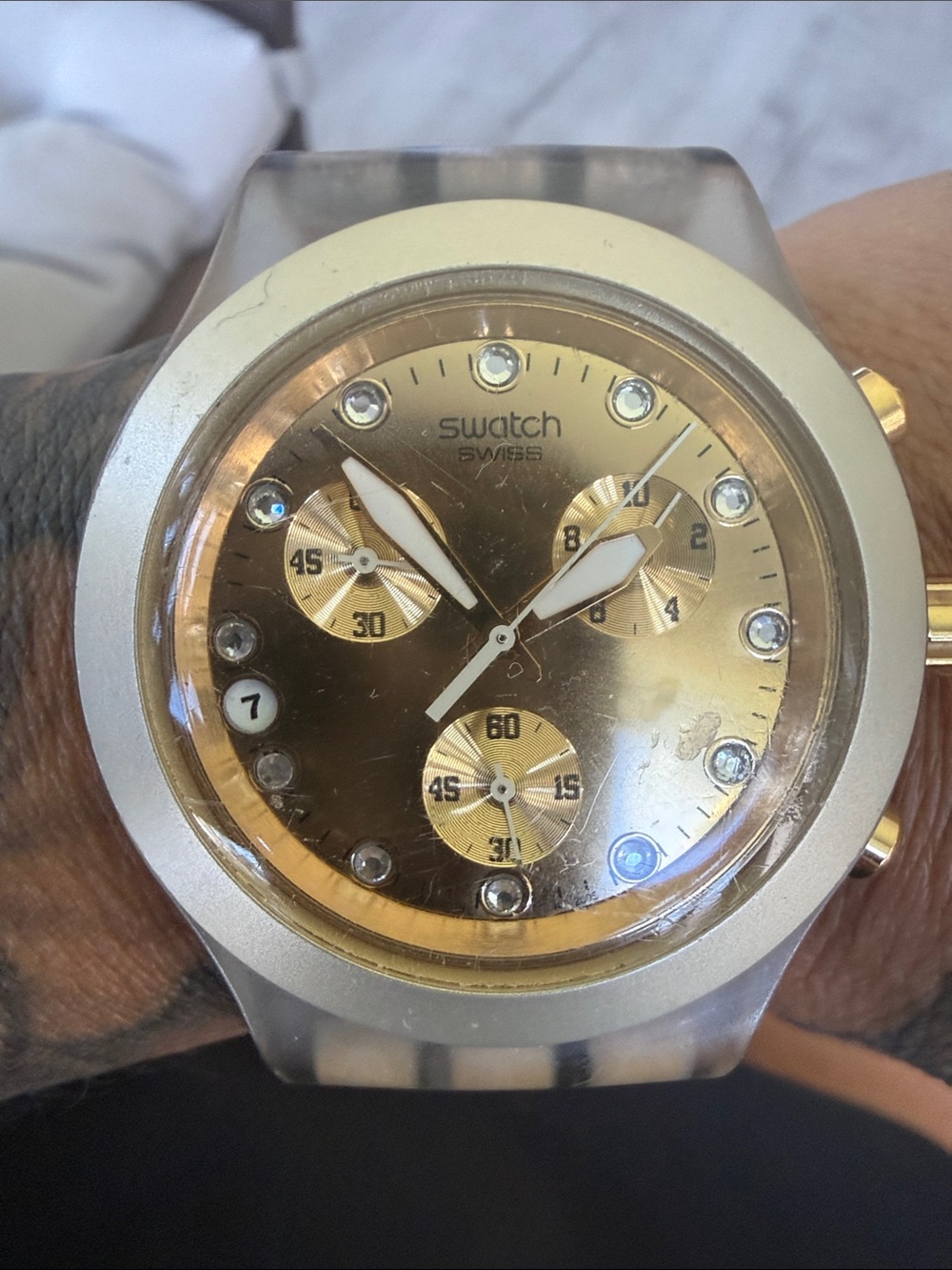 Swatch Gold Dial Chronograph Watch with Clear Strap